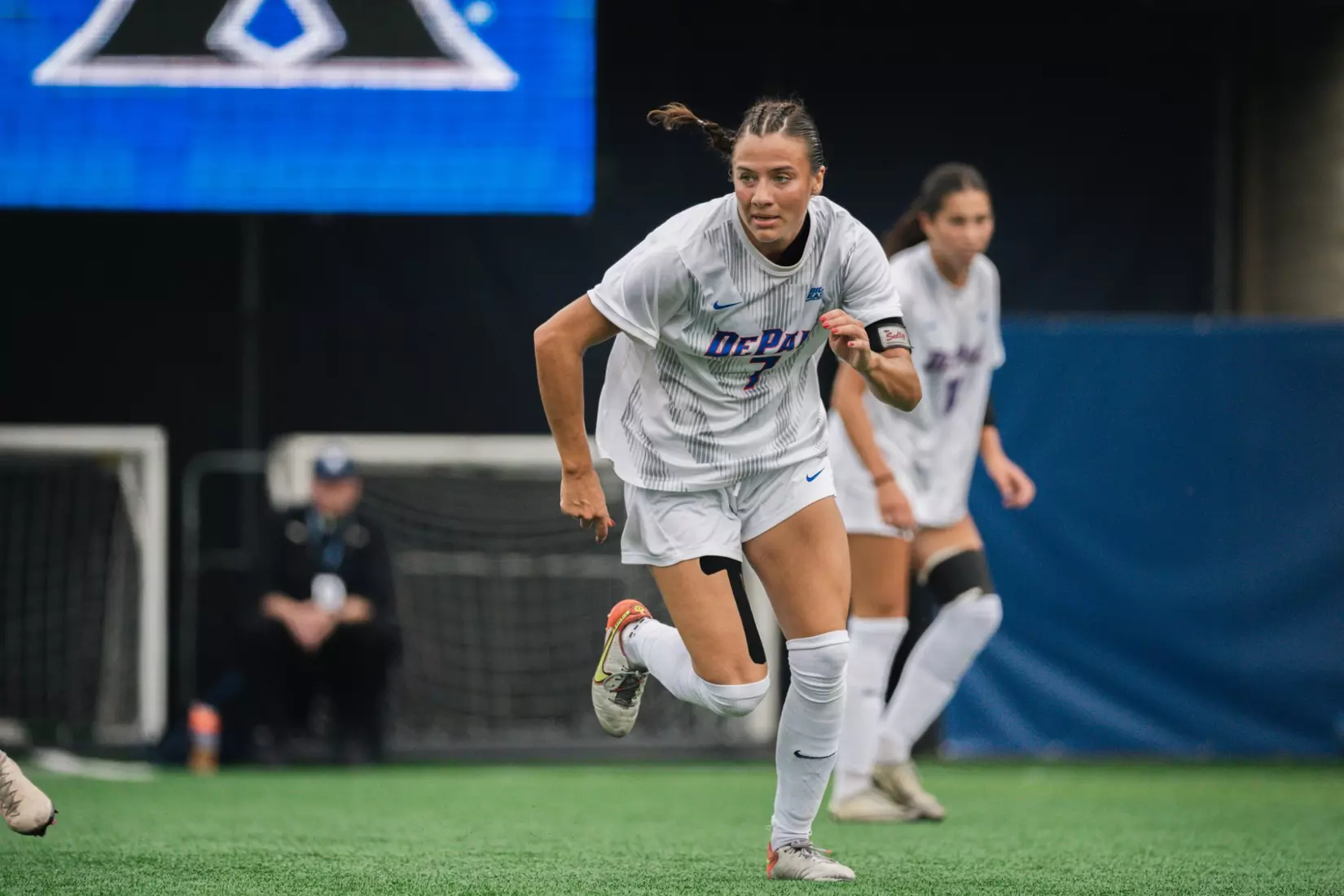 Marin Stamper tracks the ball up the field.