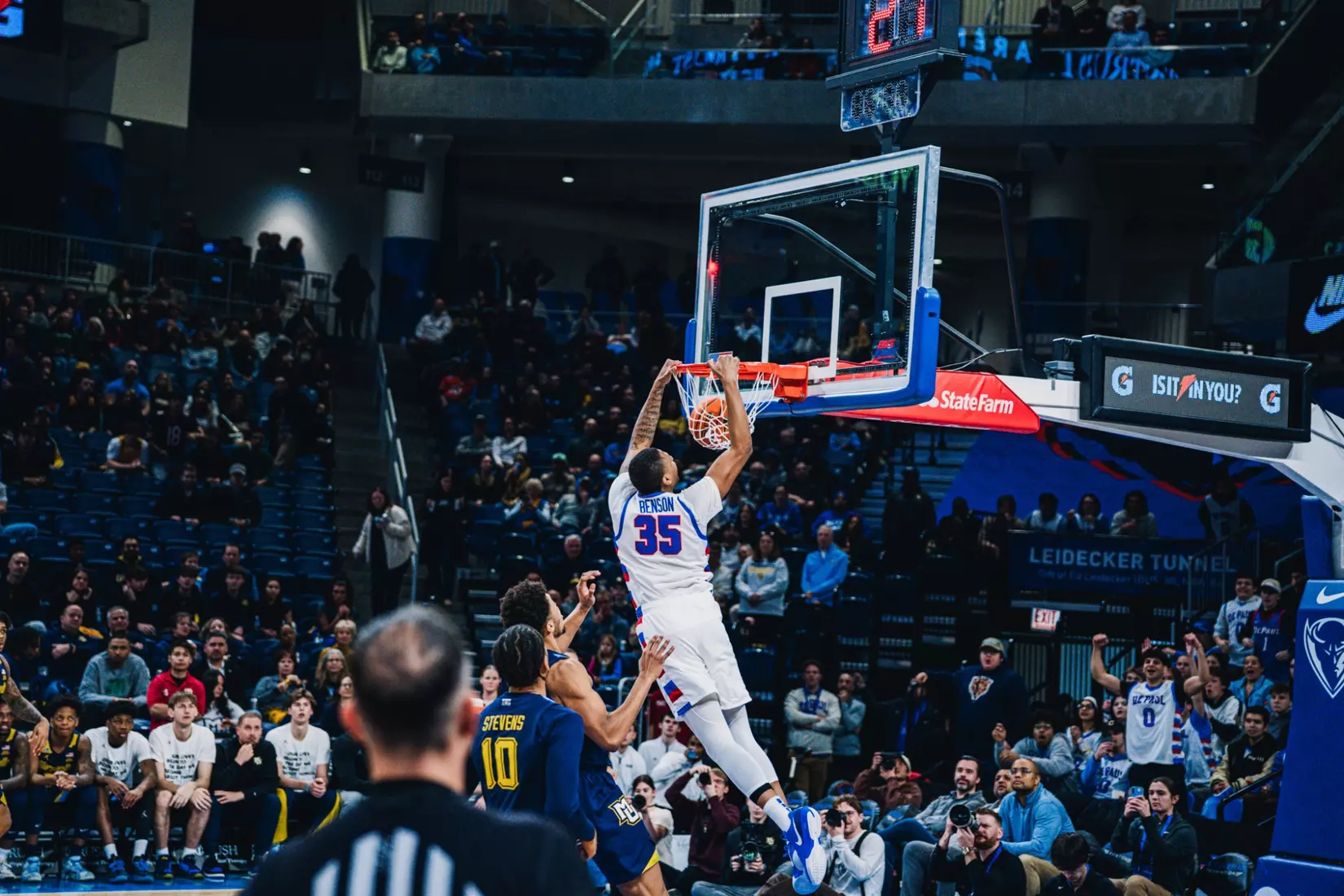 NJ Benson dunking from an alley-top from Blocker