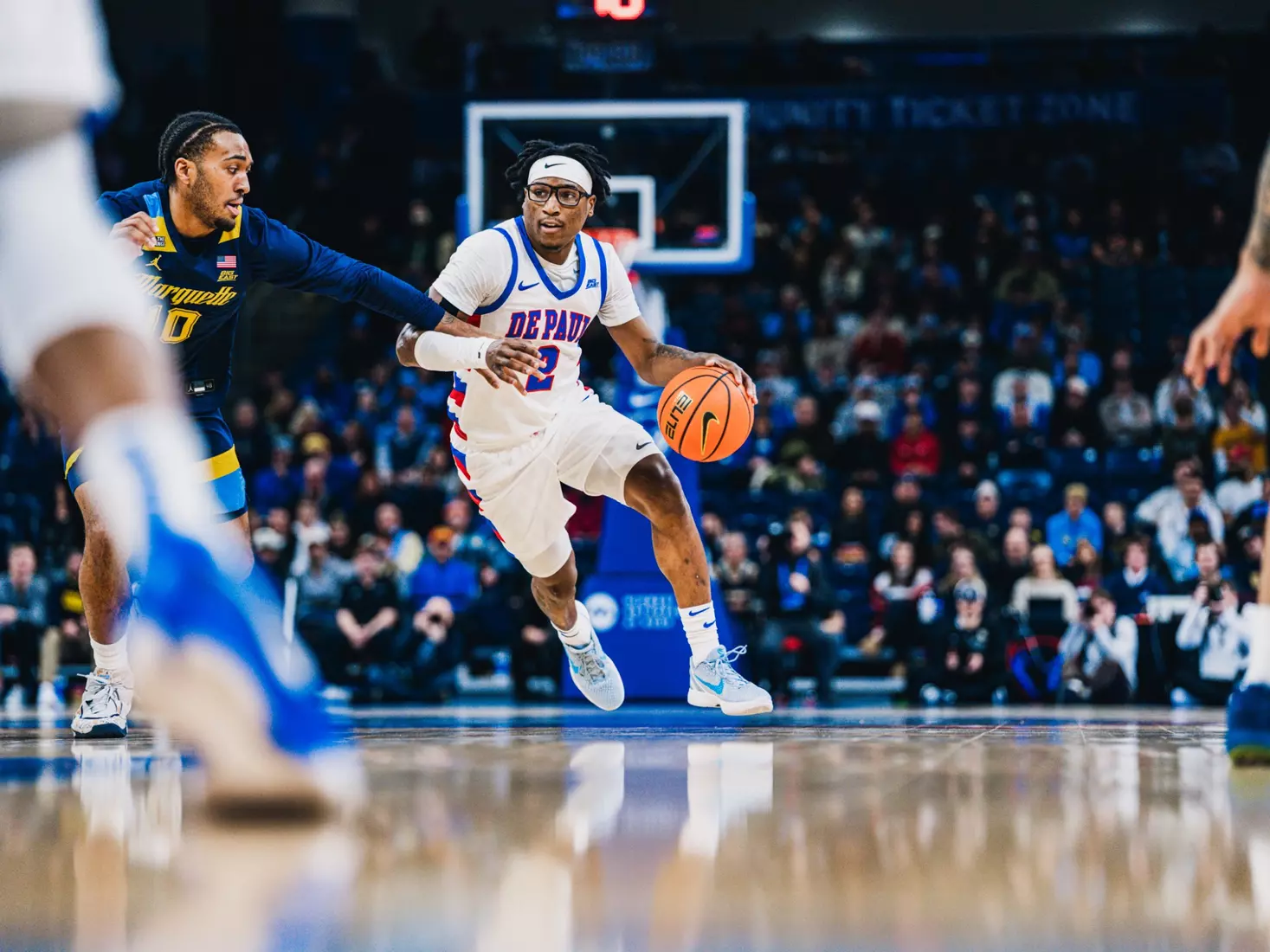 Layden Blocker dribbling down the court.