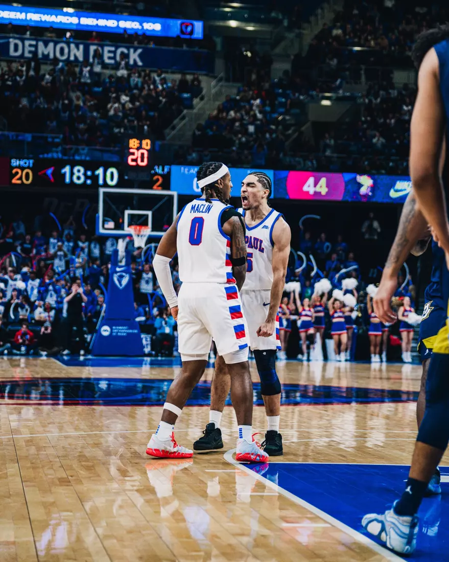 Brandon Maclin and RJ Smith celebrating
