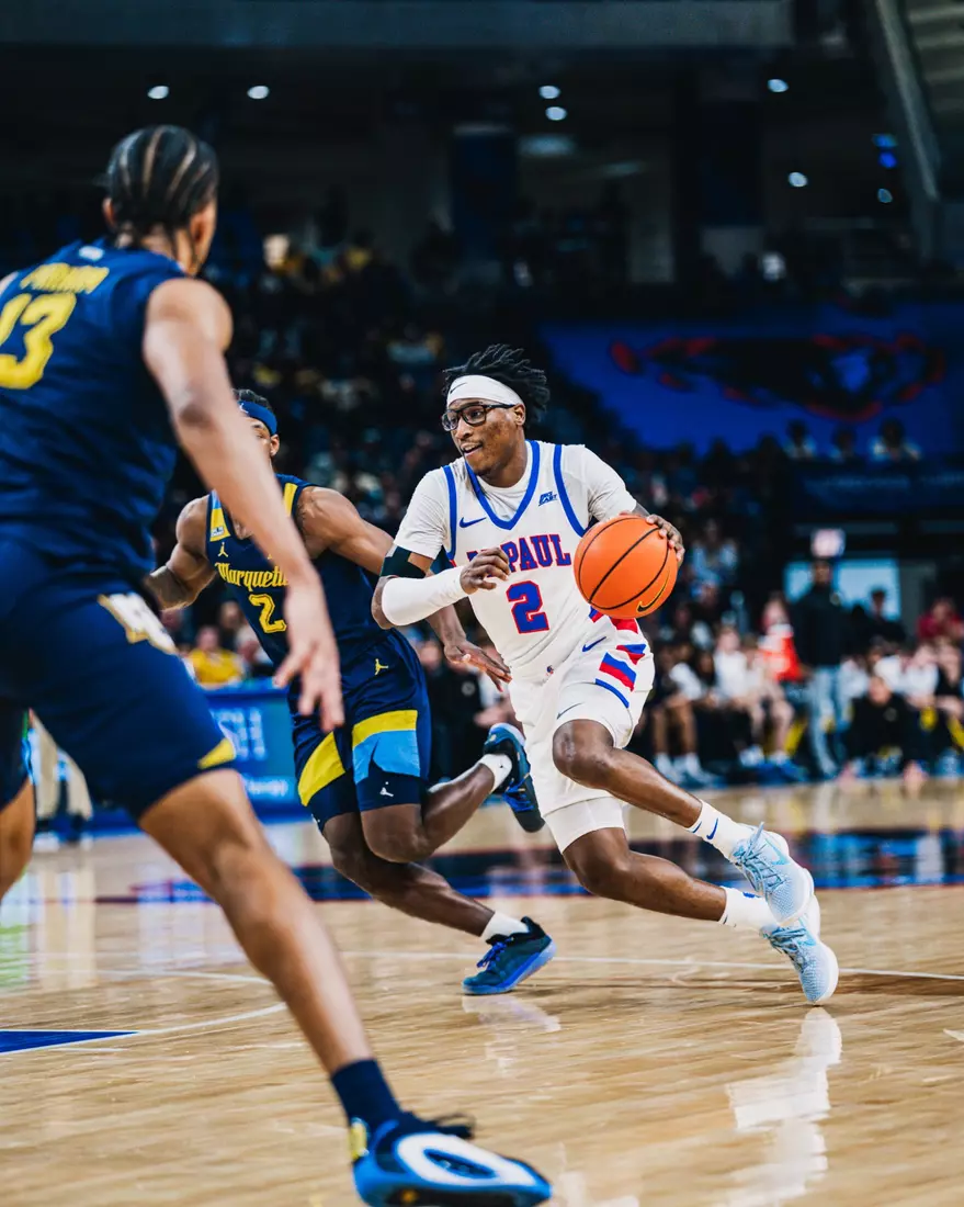 Layden Blocker driving in for a layup.