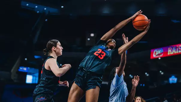 Forward Michelle Ojo strongly battles for the rebound.
