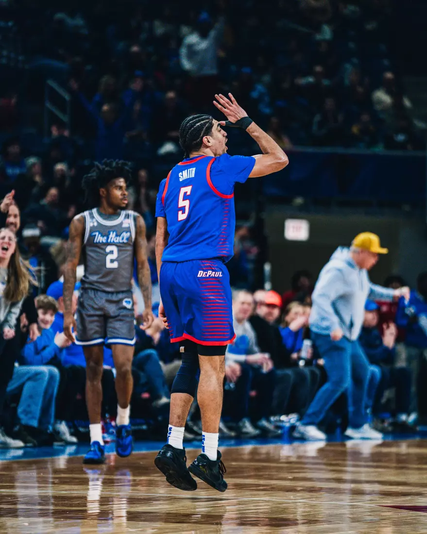 RJ Smith Celebrates a three point shot.
