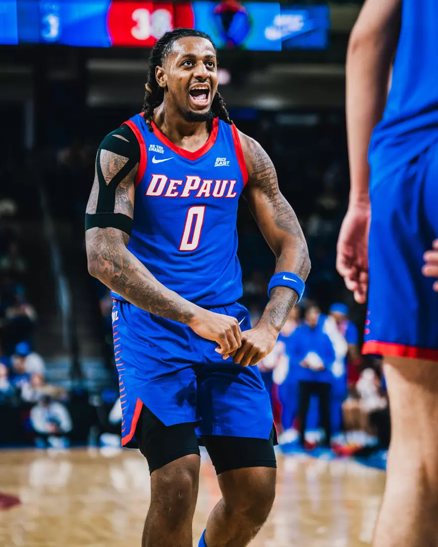 Brandon Maclin flexes after a shot.