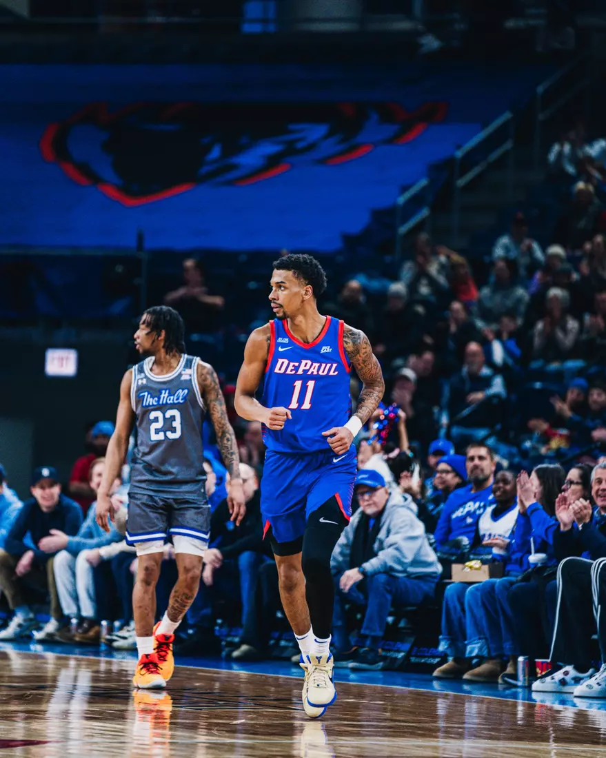 CJ Gunn runs back on defense.