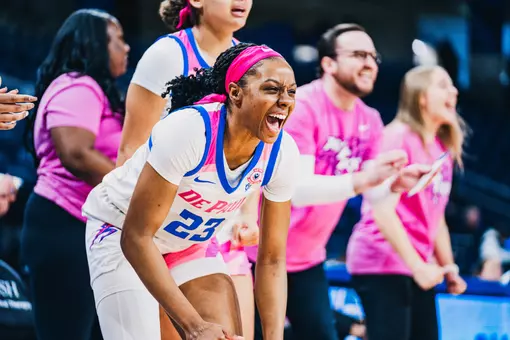 Michelle Ojo celebrates with team.