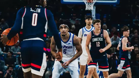 Junior RJ Smith prepares for a defensive possession against UConn.
