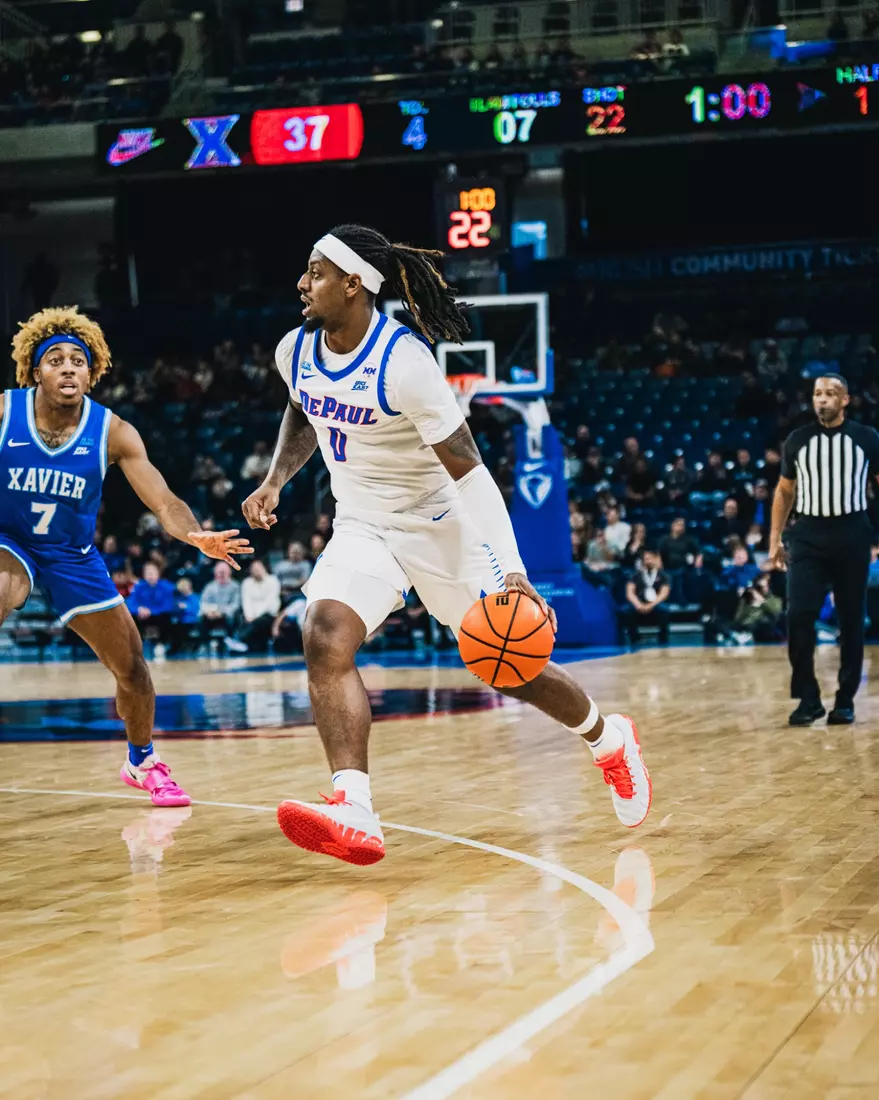 Brandon Maclin drives into the teeth of the Xavier defense.