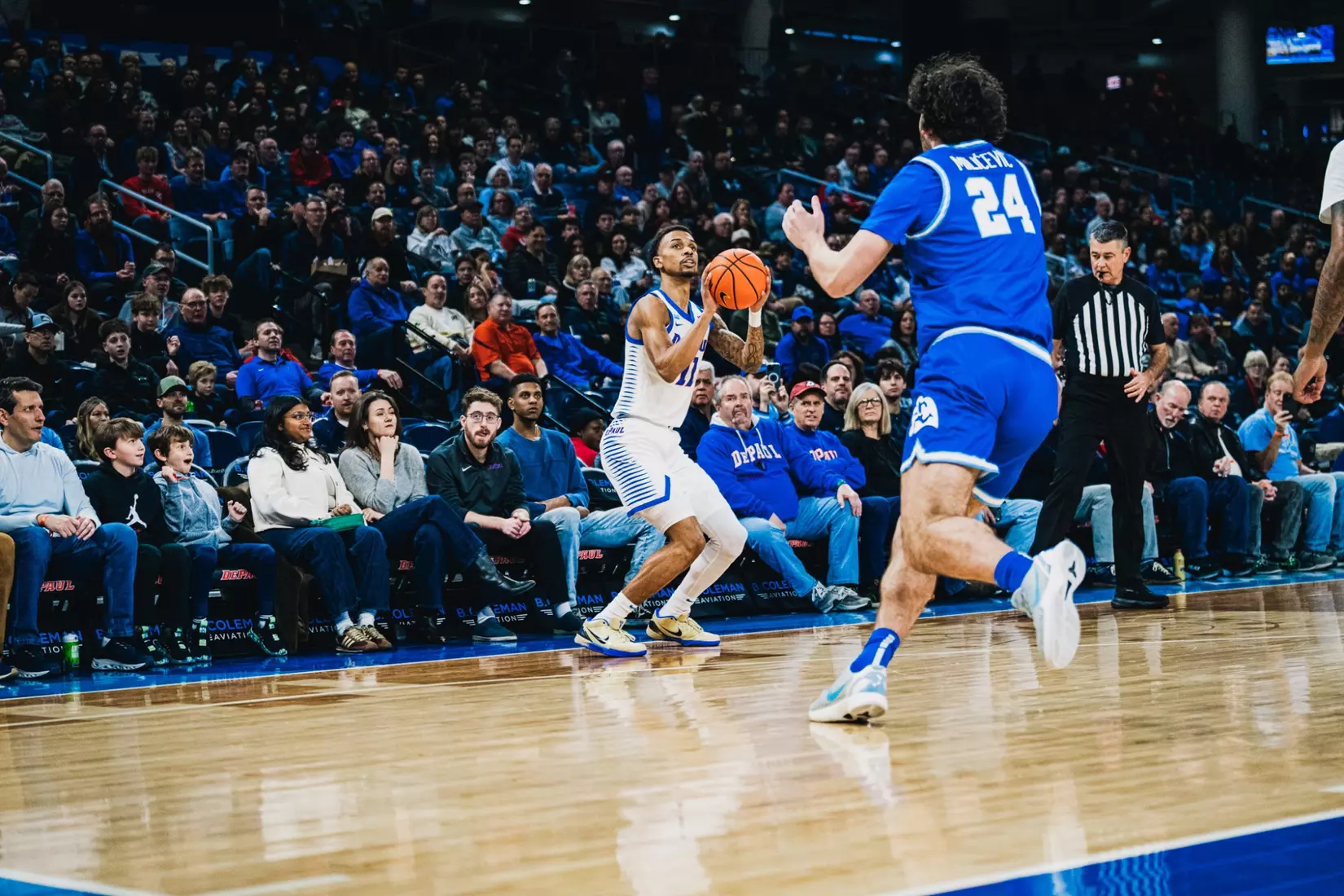 Forward CJ Gunn himself readies for the three pointer.