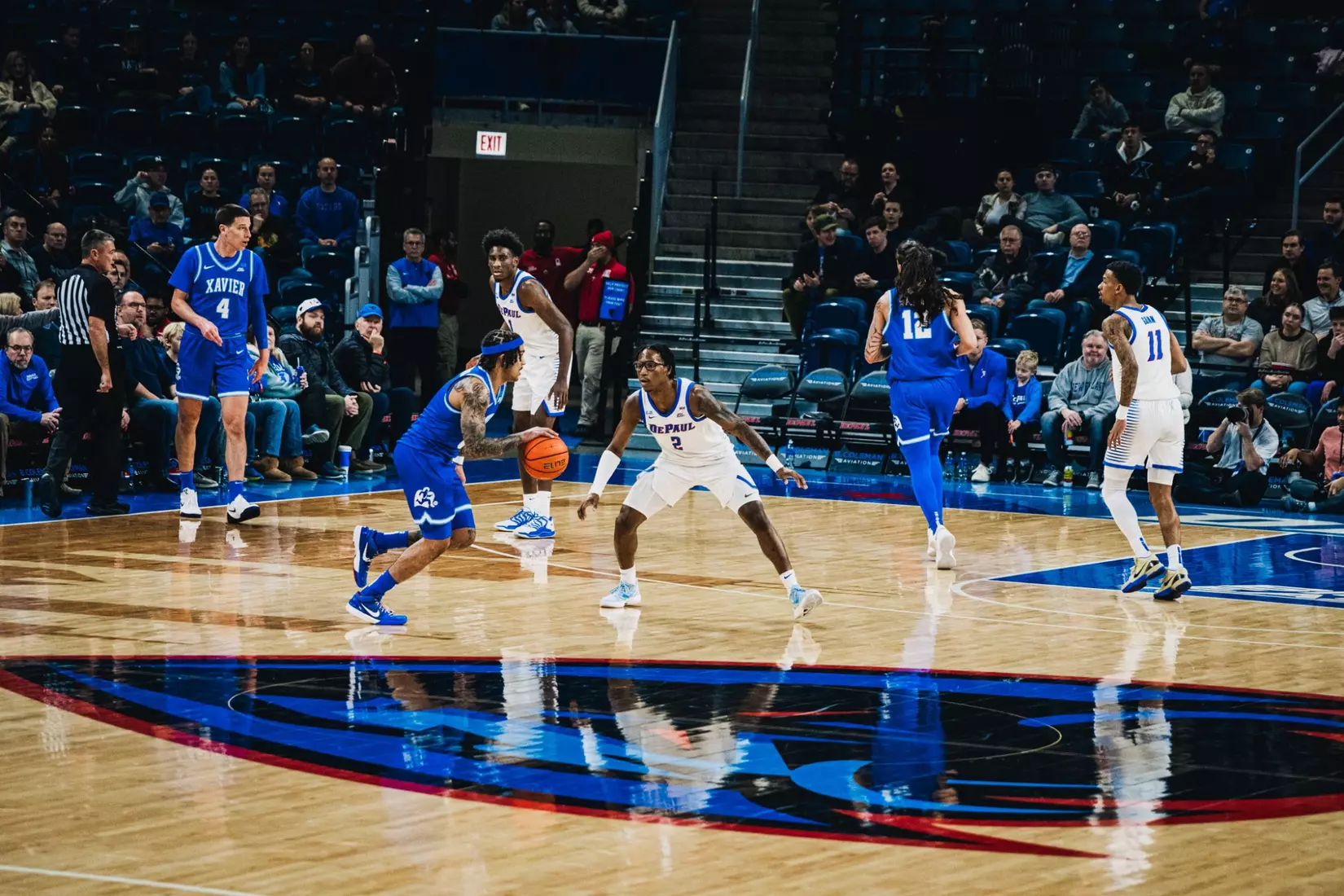 Guard Layden Blocker spearheads the defensive possession for DePaul.