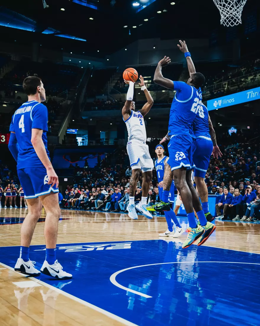 Junior Layden Blocker takes a contested midrange shot.