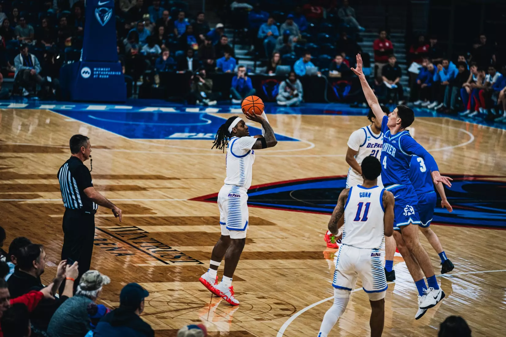 Senior Brandon Maclin takes aim for the triple.