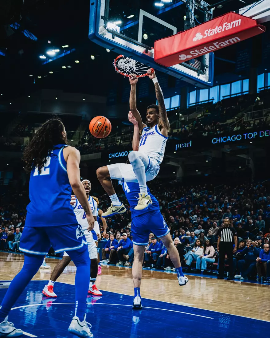 CJ Gunn slams the ball home off a back cut.