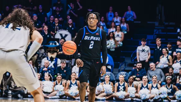 layden blocker dribbles the ball up the court