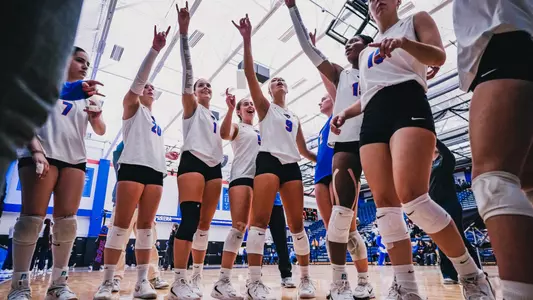 Volleyball team huddle