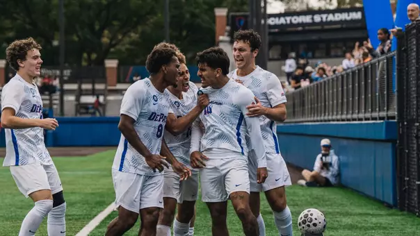 Noeh Hernandez celebrates with the team after his late equalizer