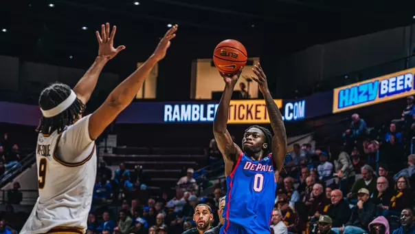 ade popoola shooting a three