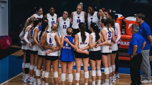 Volleyball team huddle