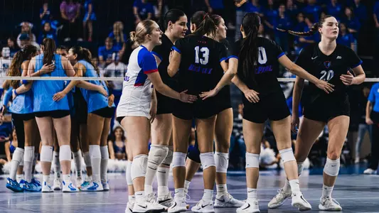 Volleyball team huddle
