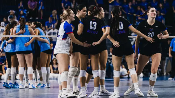 Volleyball team huddle