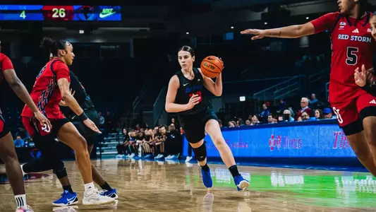 Kate Novik drives into the paint.