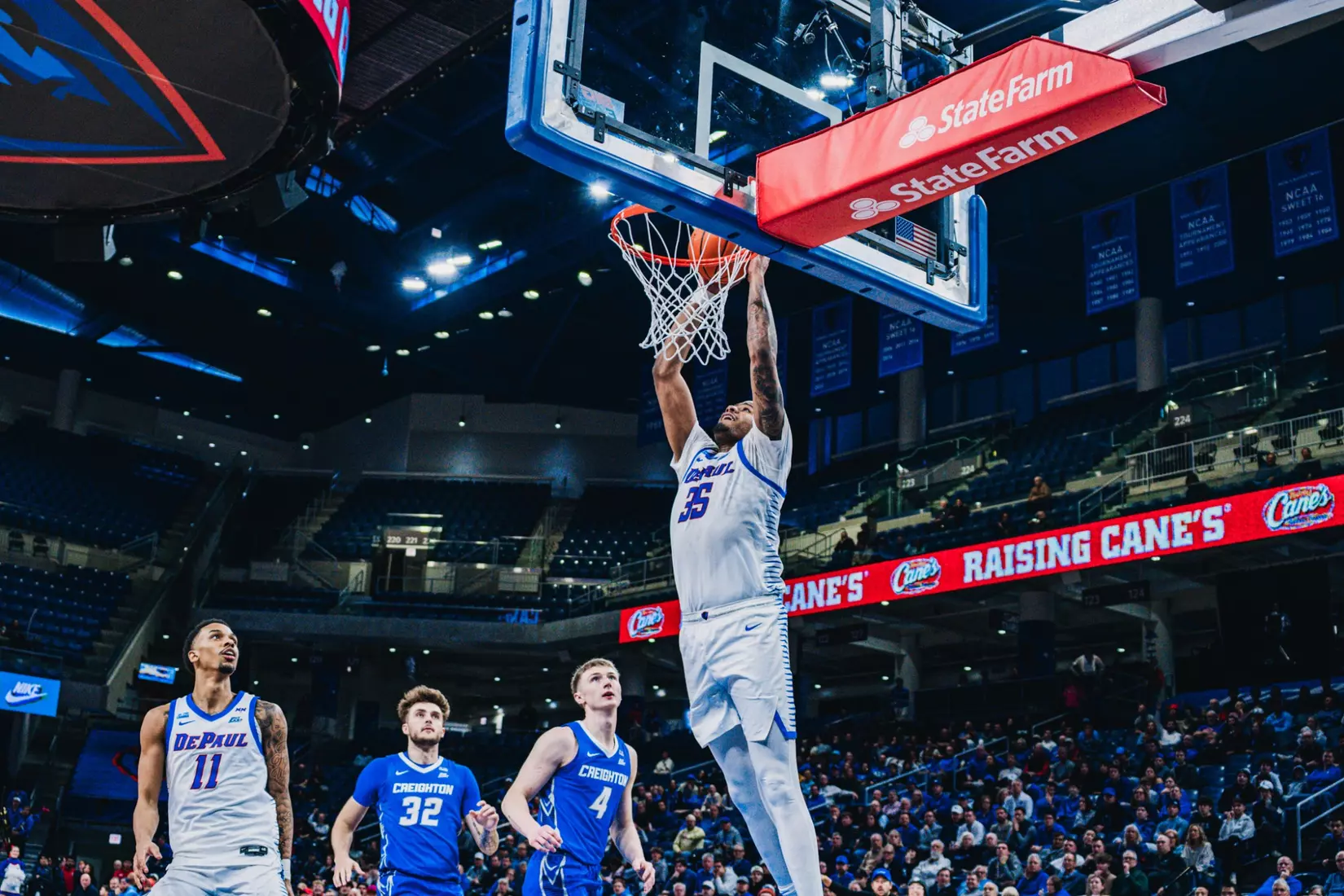 Senior NJ Benson lays down the hammer on the rim.