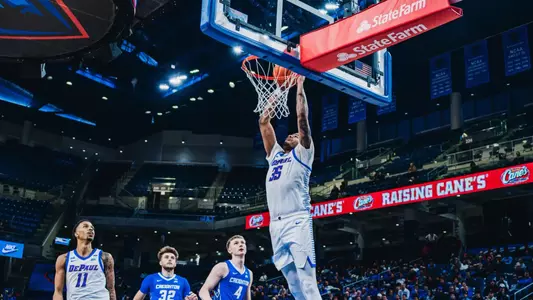 Senior NJ Benson lays down the hammer on the rim.