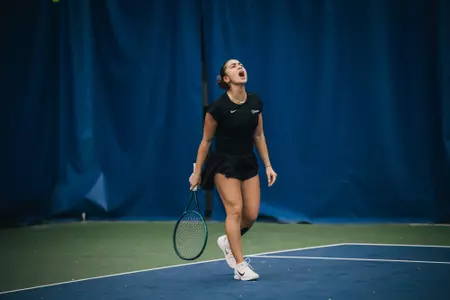 Yasemin Pehlivan celebrates after winning a point