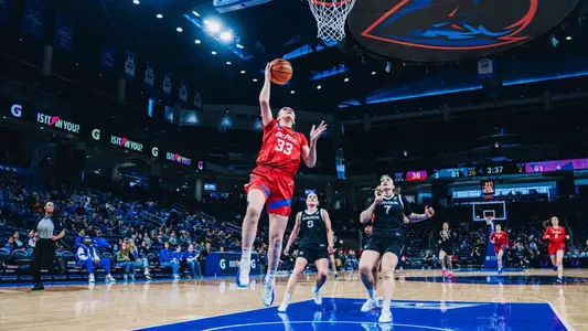 Kate Novik attempts a layup.