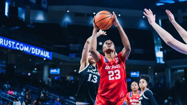 Michelle Ojo looks to attempt a layup.
