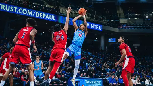 CJ Gunn attempts a jump shot.