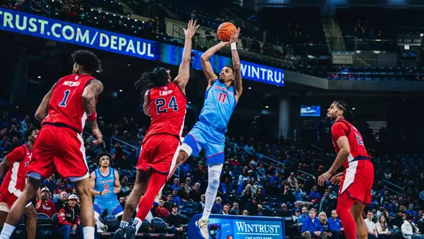 CJ Gunn attempts a jump shot.