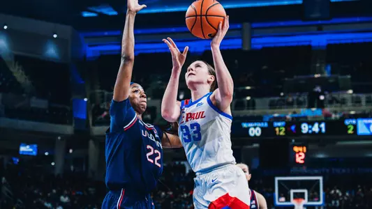 Kate Novik attempts a layup vs. UConn