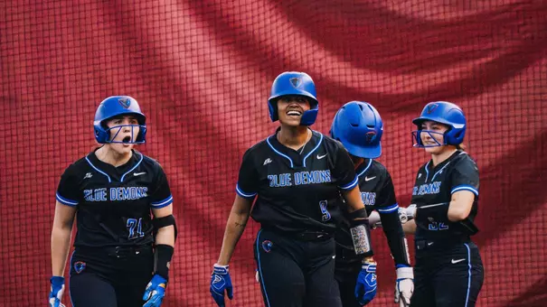 Lydia Ettema and Kali Blount celebrate a HR