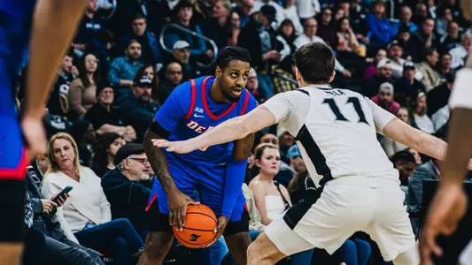brandon maclin dribbles against Providence