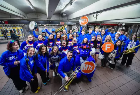 The DePaul Pep Band performs at the 34th/Herald Square MTA stop during the 2026 BIG EAST tournament