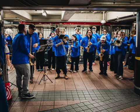 The DePaul Pep Band performs at the 34th/Herald Square MTA stop during the 2026 BIG EAST tournament