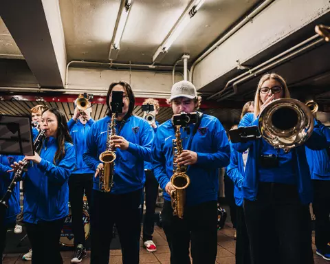 The DePaul Pep Band performs at the 34th/Herald Square MTA stop during the 2026 BIG EAST tournament