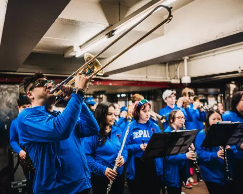 The DePaul Pep Band performs at the 34th/Herald Square MTA stop during the 2026 BIG EAST tournament