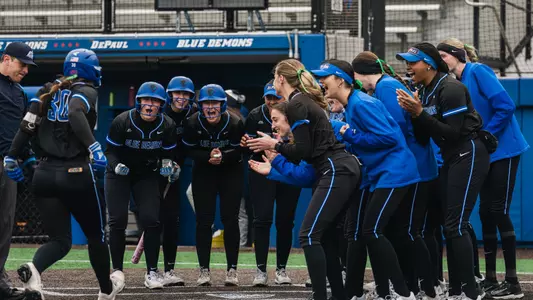 Brooke Cwick touches home plate