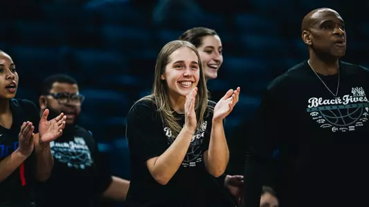 Kathleen Doyle encourages her team