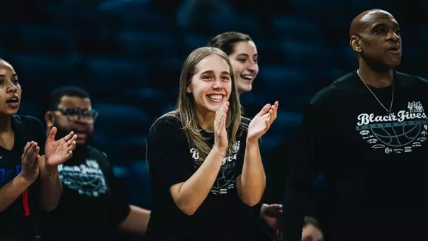 Kathleen Doyle encourages her team