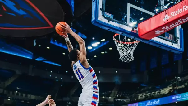 CJ Gunn dunks an alley oop.
