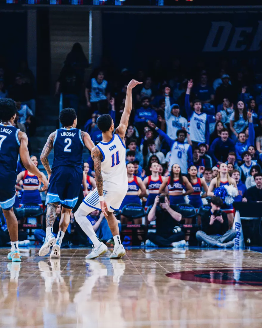 CJ Gunn shoots a three.
