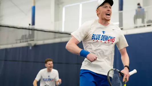 Thomas Giles celebrates in doubles