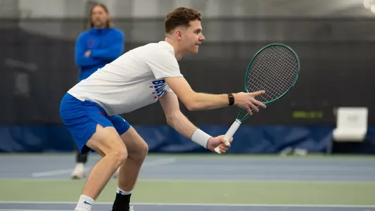Sven Moser prepares to receive a serve