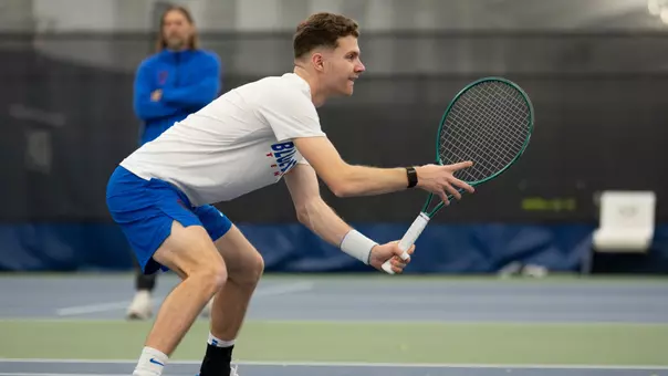 Sven Moser prepares to receive a serve