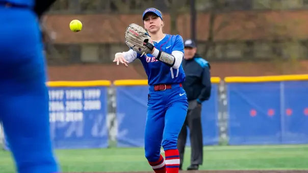 Alexis Houge throws the ball to first