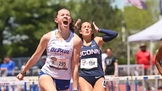 Helen Baumgarten celebrates her win in the women's 100m hurdles
