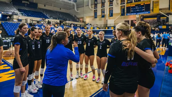Volleyball team huddle